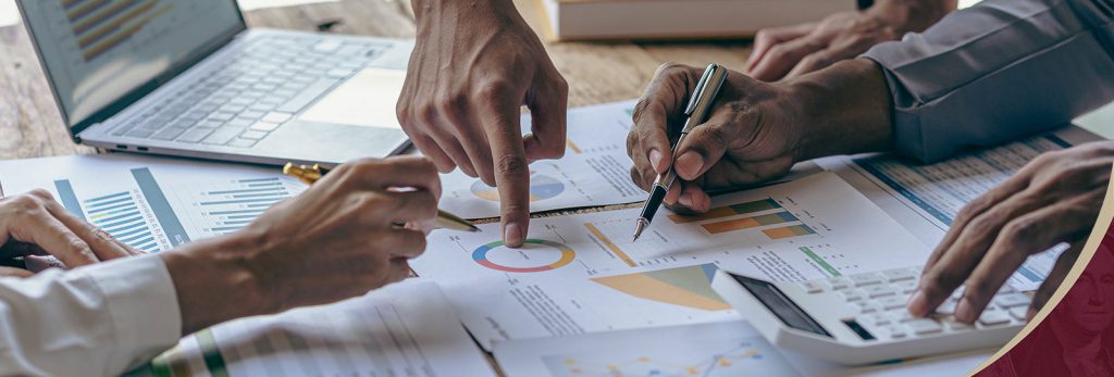 Financial client relationships - people discussing financial documents