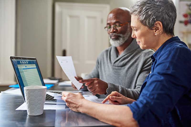 Couple working on investment planning