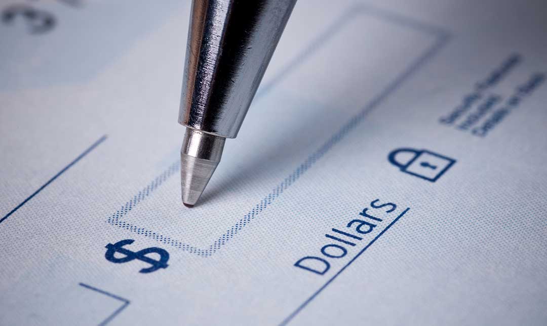 Writing a check to a financial advisor